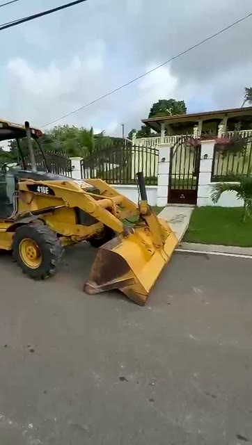 Retroexcavadora CAT 416E vendida, vista frontal con cargador